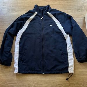 Nike navel with white accent stripes windbreaker